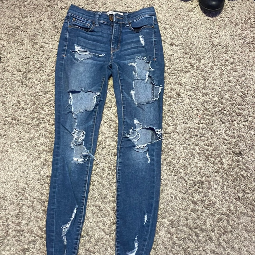 Blue really ripped jeans